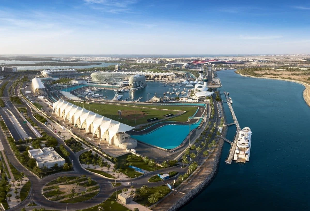 Aerial view of Yas Marina Circuit, luxury yachts, and modern architecture in Abu Dhabi